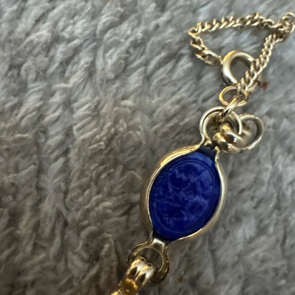 EUC multi stone gold tone bracelet